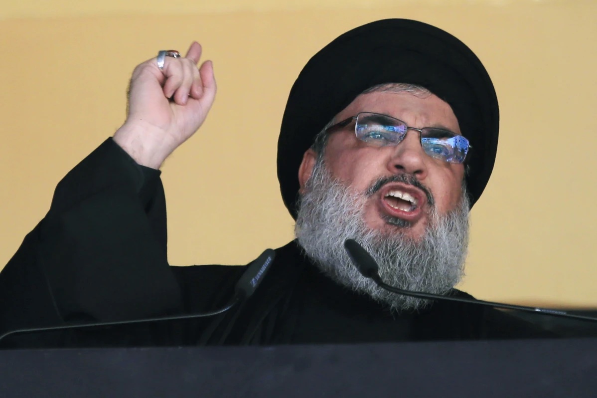 FILE - In this Oct. 24, 2015 file photo, Hezbollah leader Sheik Hassan Nasrallah addresses a crowd during the holy day of Ashoura, in a southern suburb of Beirut, Lebanon. 