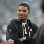 Cincinnati Bengals wide receiver Ja’Marr Chase stands on the field before a preseason NFL football game against the Indianapolis Colts, Thursday, Aug. 22, 2024, in Cincinnati.