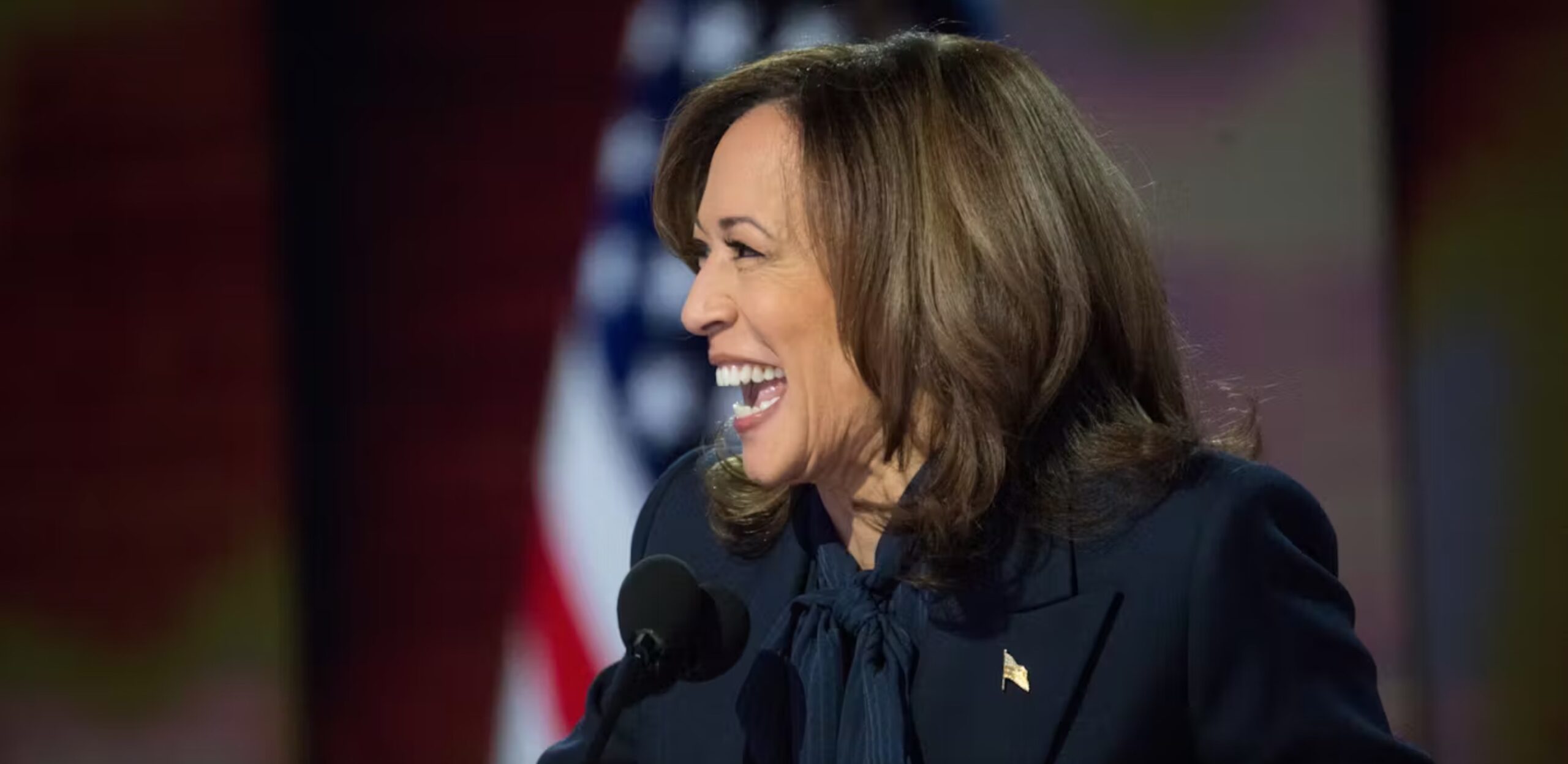 Kamala Harris laughs at Donald Trump during her convention speech on Aug. 22, 2024. 