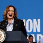 Democratic presidential nominee and U.S. Vice President Kamala Harris reacts as she speaks at North Western High School in Detroit, Michigan, U.S., September 2, 2024. REUTERS/Brendan McDermid