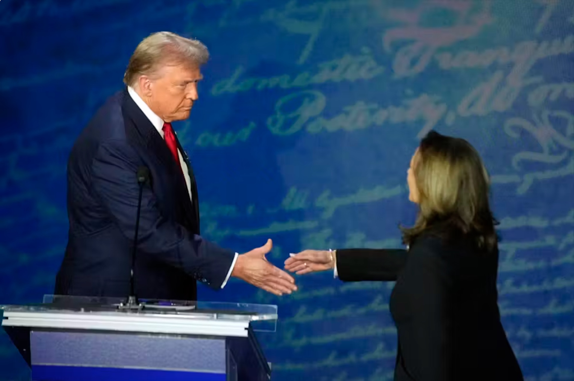 The debate began with Kamala Harris approaching Donald Trump, introducing herself and shaking hands with him. 