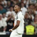 Real Madrid’s Kylian Mbappe celebrates after scoring his sides second goal during the Spanish La Liga soccer match between Real Madrid and Betis at the Santiago Bernabeu stadium in Madrid, Spain, Sunday, Sept. 1, 2024.