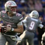 UNLV quarterback Matthew Sluka (3) looks to pass against Kansas in the first half of an NCAA college football game Friday, Sept. 13, 2024, at Children’s Mercy Park in Kansas City, Kan.