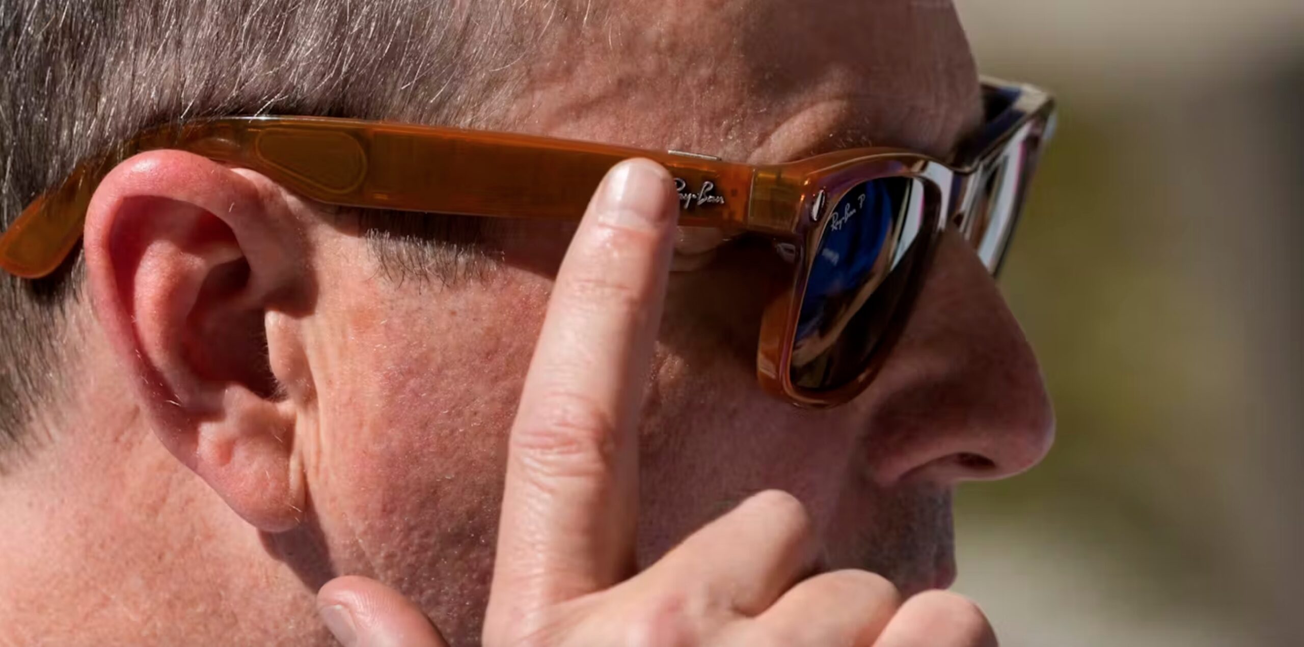 An attendee tries a pair of Ray-Ban Meta smart glasses at Meta’s Connect developer conference, on Sept. 27, 2023, in Menlo Park, Calif. 