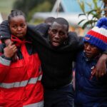 Parents of pupils who died during a fatal fire react at the Hillside Endarasha Academy, in Kieni, Nyeri County, Kenya, September 6, 2024.