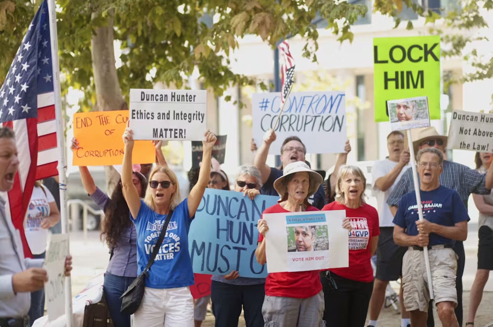 Protesters outside the federal courthouse in San Diego during an August 2018 arraignment hearing for U.S. Rep. Duncan Hunter, who was later found guilty of misusing more than 0,000 in campaign funds. 