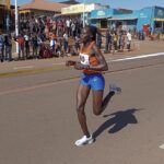 Rebecca Cheptegei, competes at the Discovery 10km road race in Kapchorwa, Uganda Friday, Jan. 20, 2023. A Cheptegei, a Ugandan athlete living in Kenya was set ablaze by her boyfriend on Sunday Sept. 1, 2024 and is currently receiving treatment for 75% burns, police said. (AP Photo)