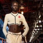 A model presents a creation from the SS25 Tommy Hilfiger collection on the MV John F. Kennedy, a decommissioned Staten Island ferryboat in Manhattan, New York City, U.S., September 8, 2024.