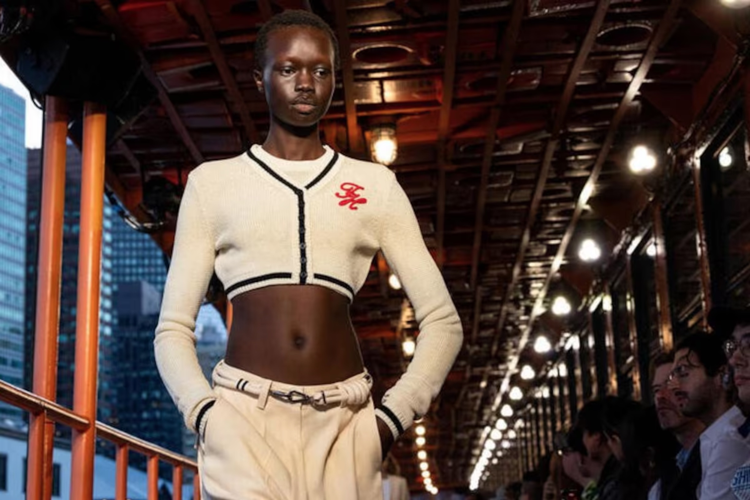 A model presents a creation from the SS25 Tommy Hilfiger collection on the MV John F. Kennedy, a decommissioned Staten Island ferryboat in Manhattan, New York City, U.S., September 8, 2024. 