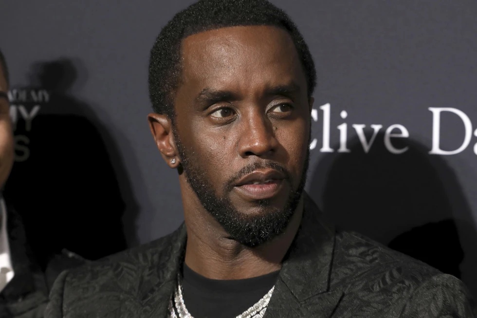 Sean Combs arrives at the Pre-Grammy Gala And Salute To Industry Icons at the Beverly Hilton Hotel on Saturday, Jan. 25, 2020