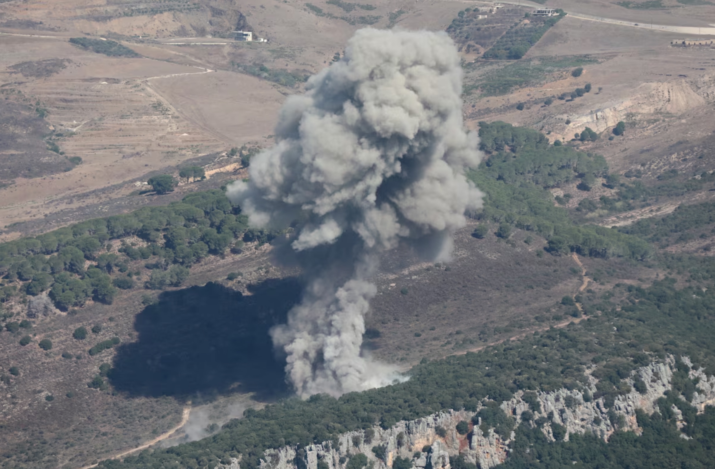 Smoke billows over southern Lebanon, amid ongoing cross-border hostilities between Hezbollah and Israeli forces, as pictured from Marjayoun, near the border with Israel, September 24, 2024. 