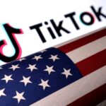 U.S. flag is placed on a TikTok logo in this illustration taken March 20, 2024.