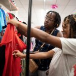 Tonya Young and her grandson Anthony Young shop at a Family Dollar store in Nashville, August 17, 2024.