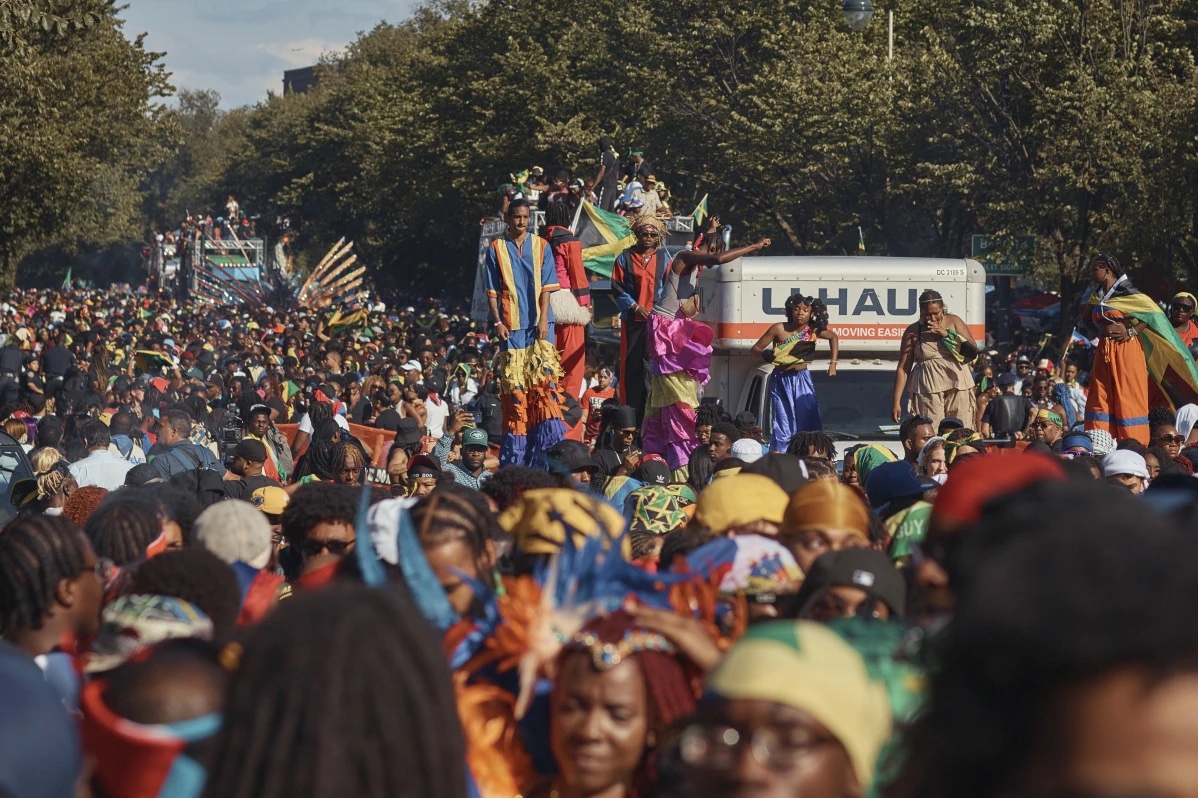 Revelers march at the intersection of Franklin Avenue and Eastern Parkway during the West Indian Day Parade on Monday, Sept. 2, 2024, in the Brooklyn borough of New York. (AP Photo/Andres Kudacki)