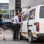 Commuters getting into a minibus taxi in Johannesburg.