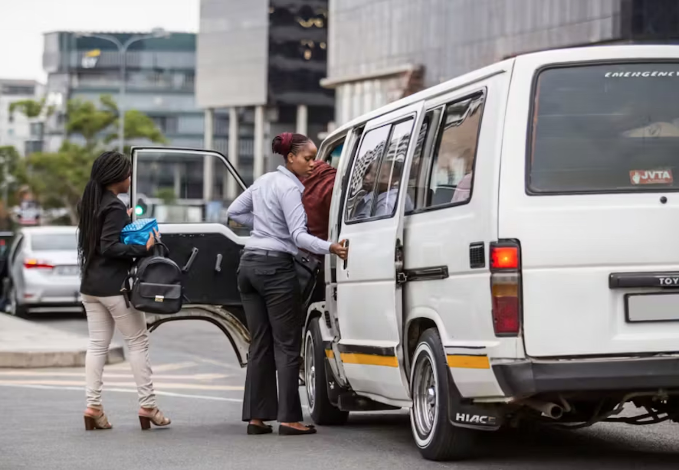 Commuters getting into a minibus taxi in Johannesburg.