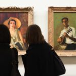 Women studying paintings by Andre Derain in the Musee de L'Orangerie in Paris France.