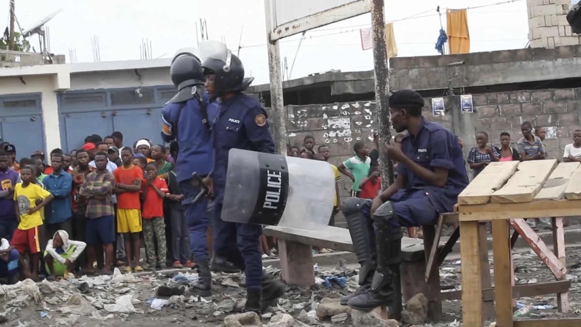 This image made from video shows police officers outside Makala prison in Kinshasa, Democratic Republic of the Congo, following an attempted jailbreak in Congo’s main prison Monday Sept. 2, 2024. (AP Photo)