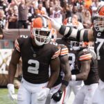 Cleveland Browns wide receiver Amari Cooper (2) is congratulated by guard Joel Bitonio (75) after scoring against the New York Giants during the first half of an NFL football game, Sunday, Sept. 22, 2024 in Cleveland.