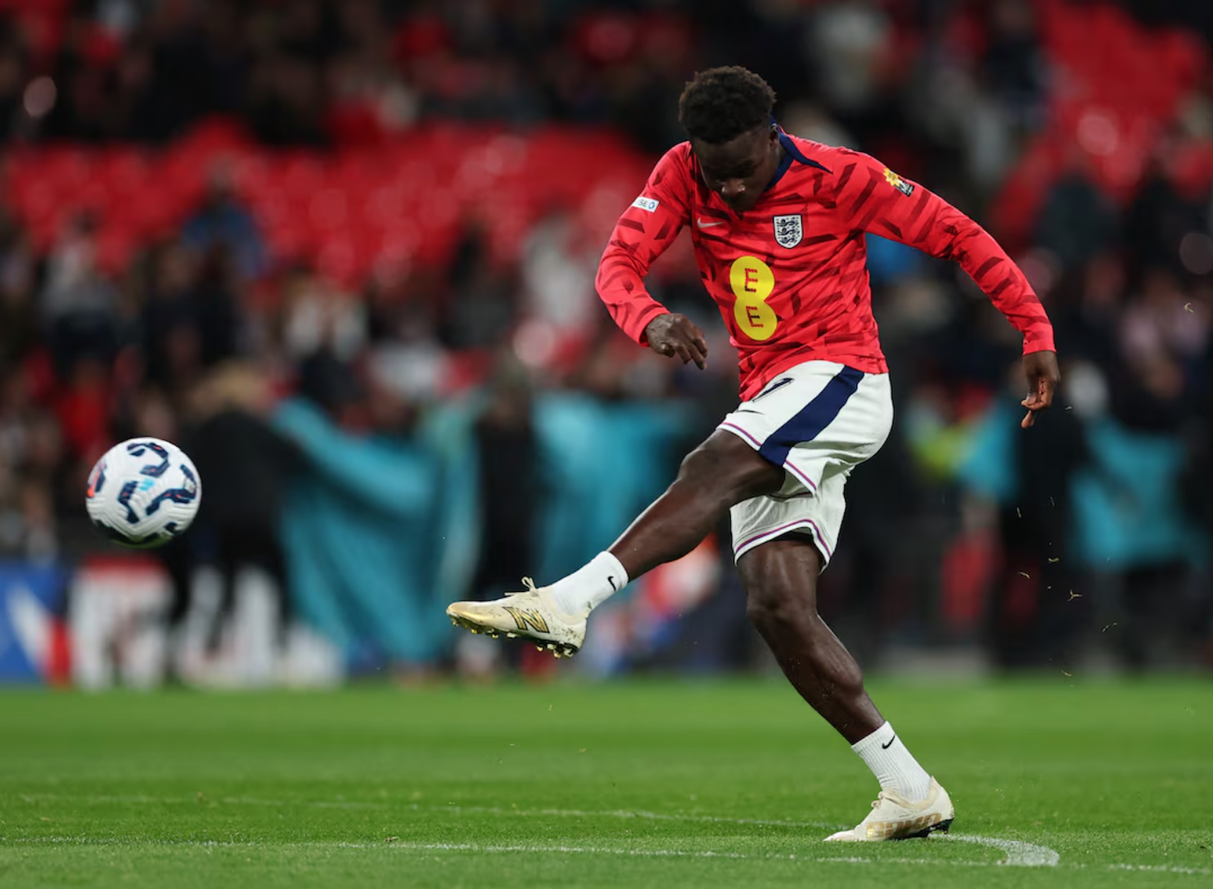 Bukayo Saka during the warm up before the match