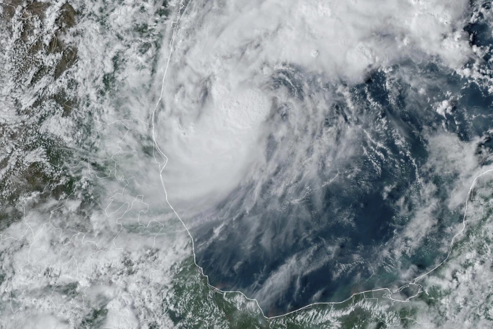 This GOES-16 GeoColor satellite image taken at 4:50 p.m. EDT and provided by National Oceanic and Atmospheric Administration (NOAA) shows Tropical Storm Milton, center, off the coast of Mexico in the Gulf of Mexico, Saturday, Oct. 5, 2024. 