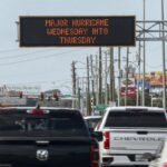 Highway signage announces the impending arrival of Hurricane Milton and the evacuations zones on Tuesday, Oct. 8, 2024, in Port Richey, Fla.