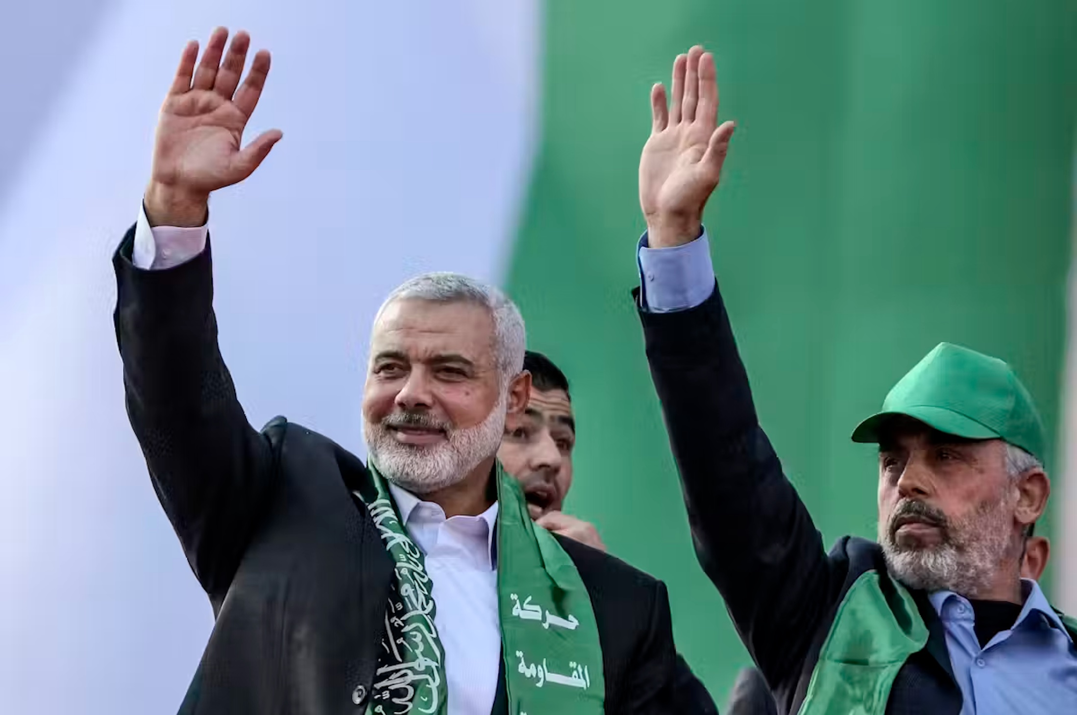 Top Hamas leaders Ismail Haniyeh (left) and leader of Hamas movement in Gaza Strip Yahya Al Sinwar (R) attend a Hamas rally to mark the group’s 30th anniversary, in Gaza City, Gaza Strip, 14 December 2017.