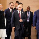 Indian Prime Minister Narendra Modi, Russian President Vladimir Putin and Chinese President Xi Jinping attend a family photo ceremony prior to the BRICS Summit plenary session in Kazan, Russia, Wednesday, Oct. 23, 2024.