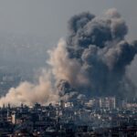 Smoke rises over Dahiyeh in Beirut's southern suburbs, October 6, 2024.