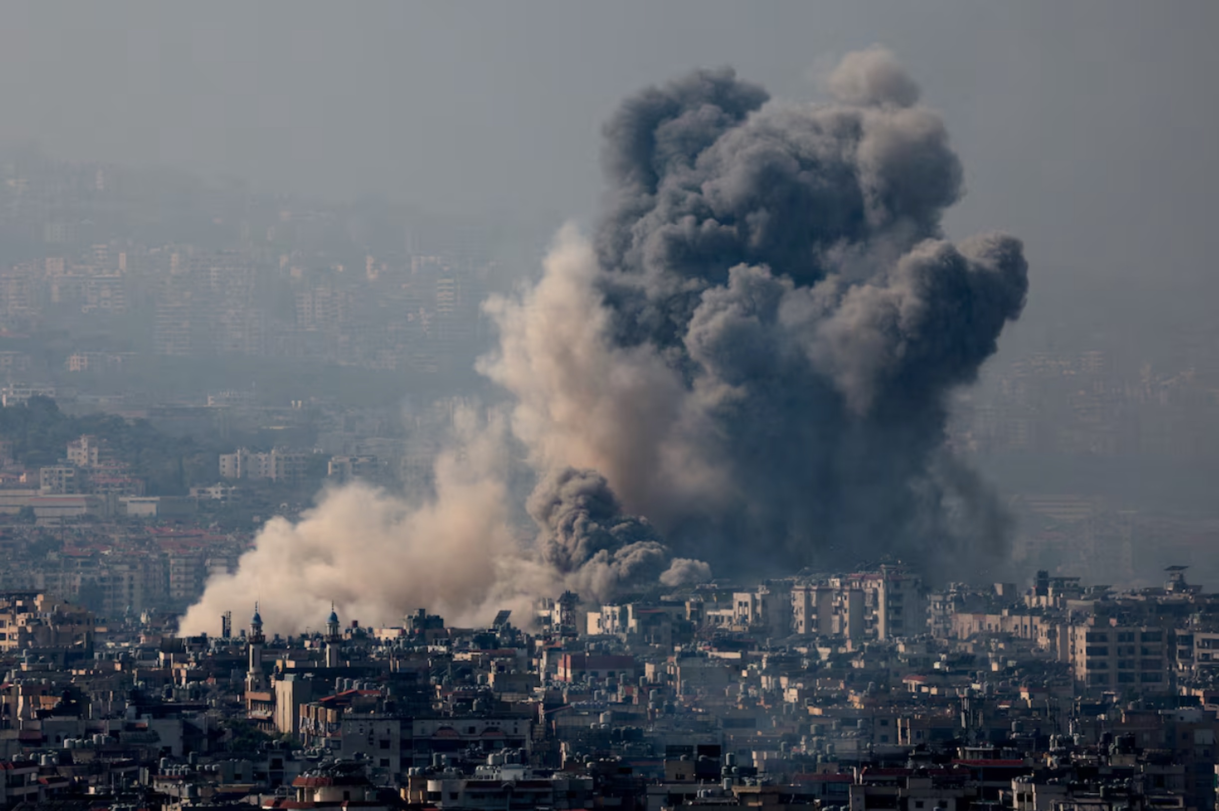 Smoke rises over Dahiyeh in Beirut's southern suburbs, October 6, 2024. 