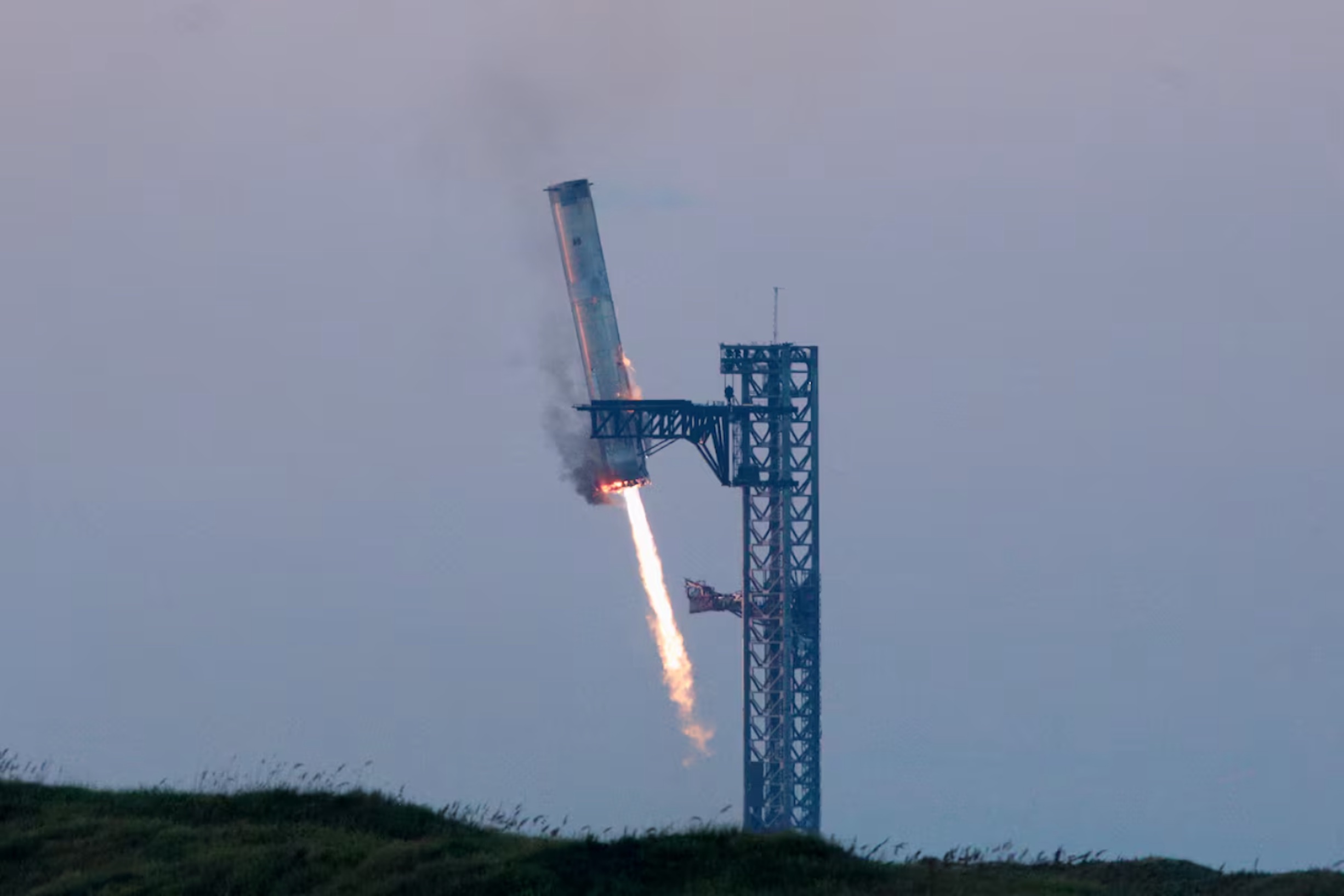 SpaceX's Super Heavy booster lands during SpaceX Starship's fifth flight test, in Boca Chica, Texas, U.S., October 13, 2024. 