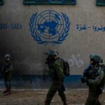 Israeli soldiers enter the UNRWA headquarters in Gaza on Feb. 8, 2024.