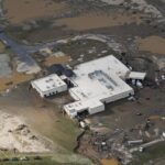 An aerial view of flood-damaged Unicoi County Hospital in the aftermath of Hurricane Helene, Saturday, Sept. 28, 2024, in Erwin, Tenn.