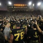 Vanderbilt celebrates the team’s 40-35 win against Alabama on the field after an NCAA college football game Saturday, Oct. 5, 2024, in Nashville, Tenn.