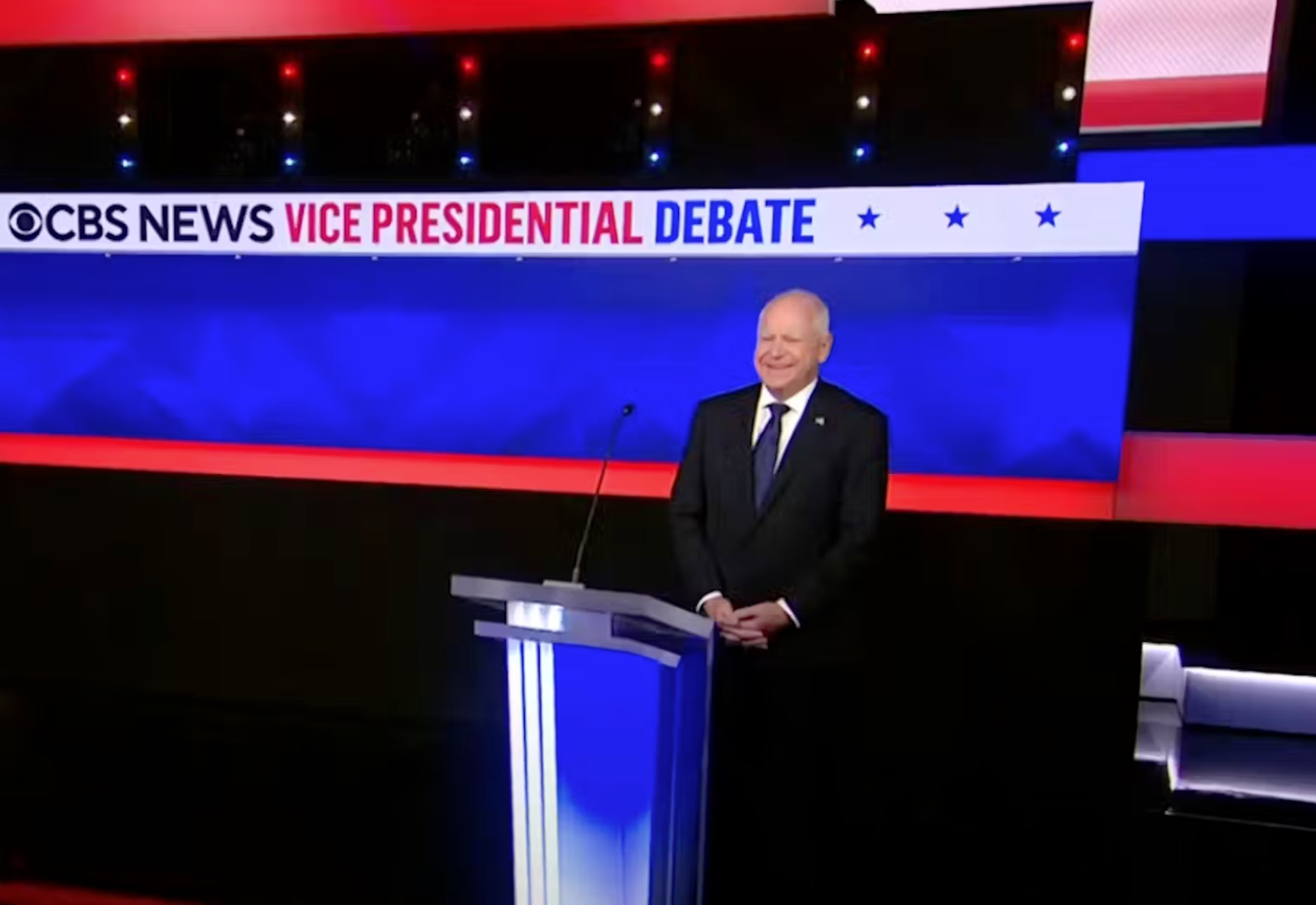 At the beginning of the debate, Walz attempted to collect himself with a wide smile. CBS/YouTube