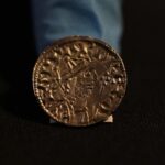 An Edward the Confessor Pyramid coin (1065-6), part of the Chew Valley Hoard of 2,584 coins, buried in the turmoil following the Norman Invasion of Britain in 1066, on display at the British Museum in London, Tuesday, Oct. 22, 2024, the hoard is valued at £4.3 million pounds, (US$5.58 million), a record find.