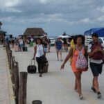 Residents and tourists heed a voluntary evacuation call as Hurricane Milton advances, on the island of Holbox, Mexico, October 7, 2024.