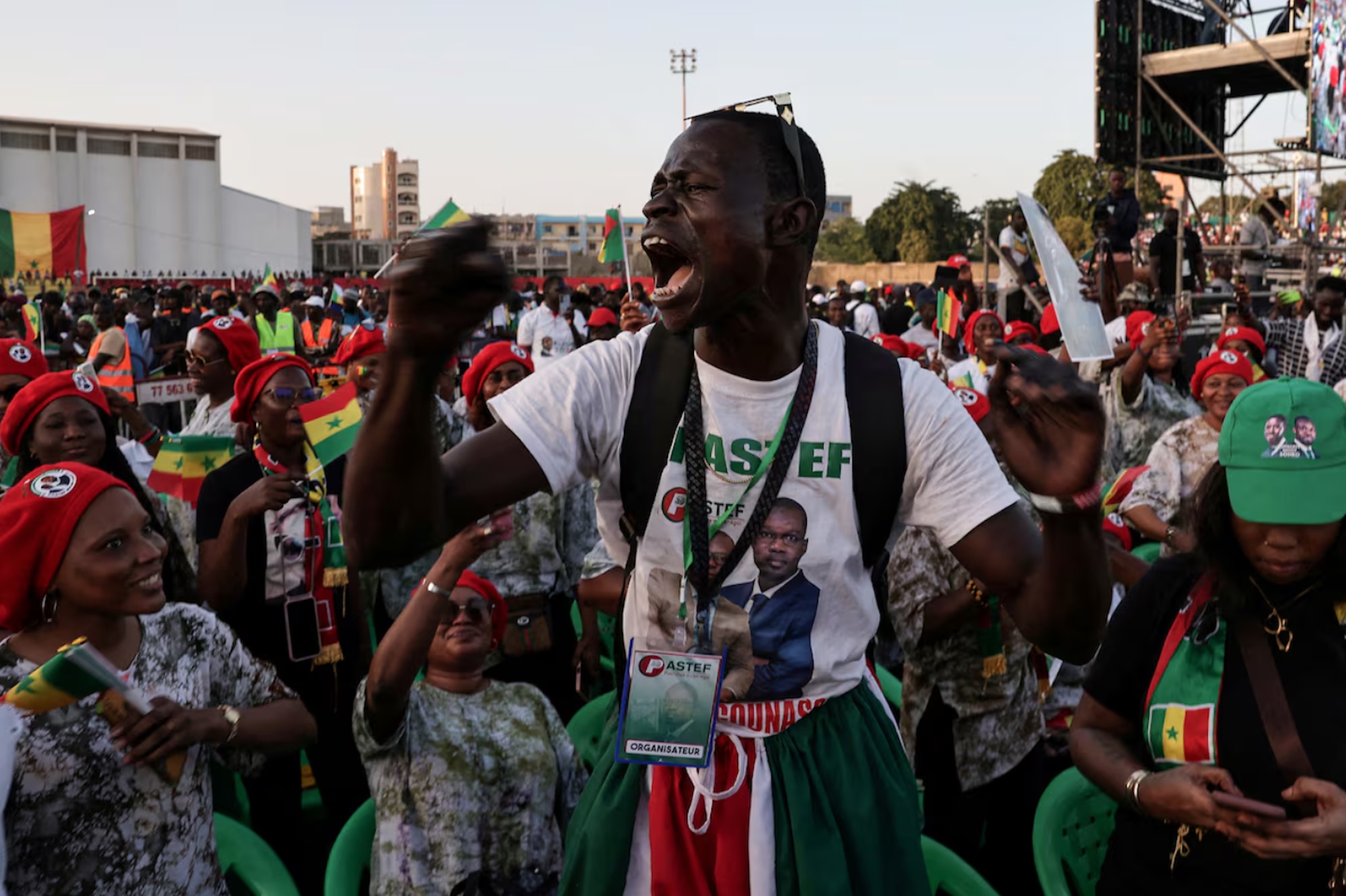 A supporter of Senegal's Prime Minister and the head of the ruling Pastef party Ousmane Sonko reacts as he attends a campaign rally for the upcoming early legislative election, in Guediawaye on the outskirts of Dakar, Senegal, November 13, 2024. 