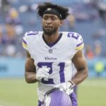 Minnesota Vikings cornerback Akayleb Evans (21) walks off the field following an NFL football game against the Tennessee Titans, Nov. 17, 2024, in Nashville, Tenn.