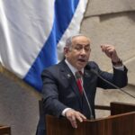 FILE - Israel’s Prime Minister Benjamin Netanyahu addresses lawmakers in the Knesset, Israel’s parliament, in Jerusalem. Monday Nov. 18, 2024.