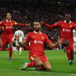 Soccer Football - Champions League - Liverpool v Real Madrid - Anfield, Liverpool, Britain - November 27, 2024 Liverpool's Cody Gakpo celebrates scoring their second goal with Virgil van Dijk and Ibrahima Konate