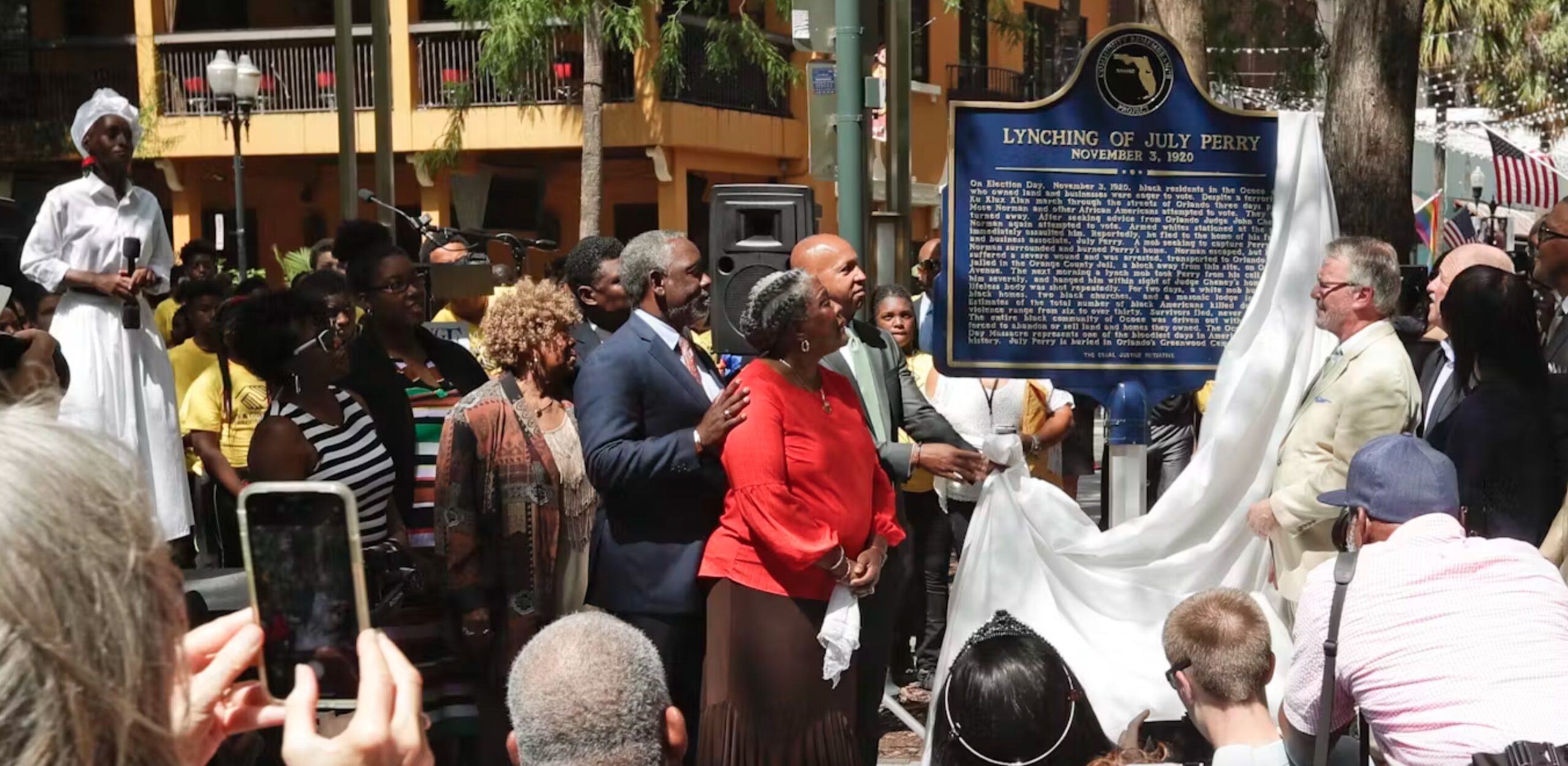 Descendants of July Perry attend a 2019 ceremony unveiling a historical marker of his lynching. 