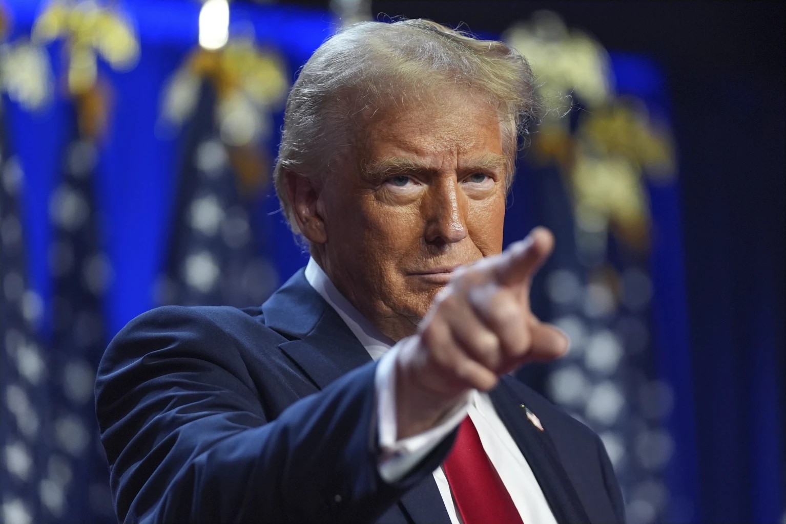 Republican presidential nominee former President Donald Trump arrives at an election night watch party at the Palm Beach Convention Center, Wednesday, Nov. 6, 2024, in West Palm Beach, Fla.