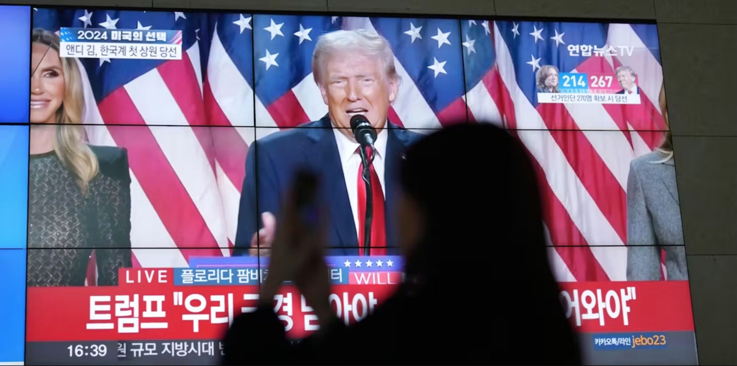 A viewer in Seoul, South Korea, watches Donald Trump declare victory in the 2024 US presidential election. 