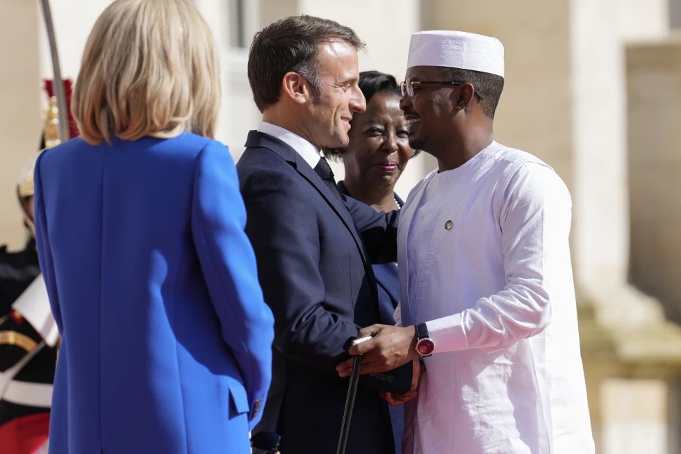 France’s President Emmanuel Macron, left, and Secretary General of the Organisation Internationale de la Francophonie Louise Mushikiwabo, center, welcome Chad’s President General Mahamat Idriss Deby Itno for the 19th Francophonie summit in Villers-Cotterets, France, Oct. 4, 2024. 