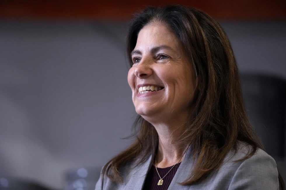 Republican gubernatorial candidate Kelly Ayotte, who faces Democrat Joyce Craig in the November 2024 election, smiles during a visit to a local concrete coating business, Wednesday, Oct. 16, 2024, in Manchester, N.H.