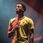 In this Aug. 25, 2017, file photo, NBA YoungBoy performs at the Lil’ WeezyAna Fest at Champions Square in New Orleans.