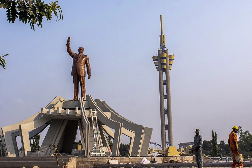 Workers stand by a memorial for Democratic Republic of the Congo independence hero Patrice Lumumba, in Kinshasa, Congo, June 20, 2022.