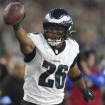 Philadelphia Eagles running back Saquon Barkley (26) reacts after a run against the Los Angeles Rams during the second half of an NFL football game in Inglewood, Calif., Sunday, Nov. 24, 2024.