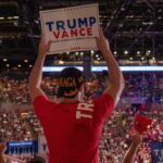 Supporters watch Donald Trump speak at a rally in Uniondale, N.Y., on Sept. 18, 2024.